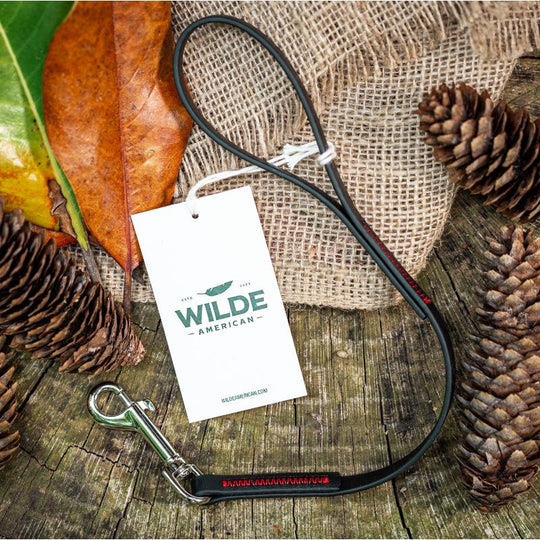 Wilde American Micro Leash Dog Leash on piece of wood with branded tag