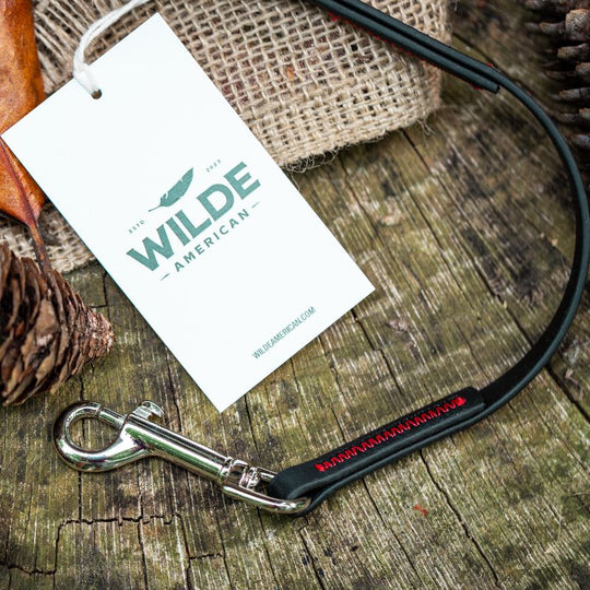 Wilde American Micro Leash Dog Leash on tree stump with branded tag